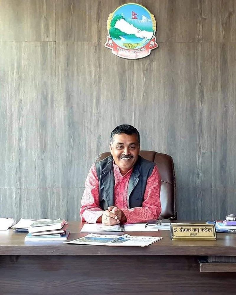 Deepak Babu Kandel at the mayor's desk, Palungtar Municipality
